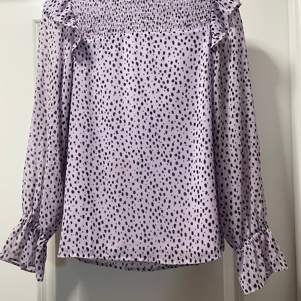 Purple and black long sleeve shirt.